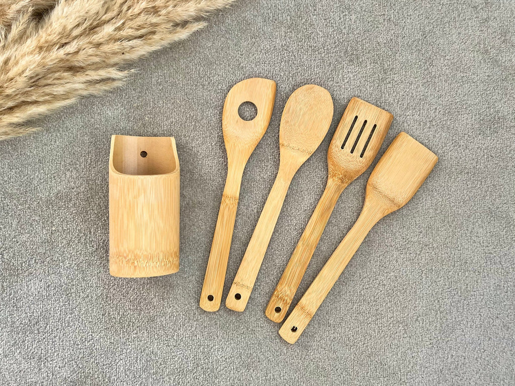 https://www.happyplacethings.com/cdn/shop/products/eco-bamboo-utensil-set-utensils-holder-wooden-cooking-spoon-wood-spatula2_1024x1024.jpg?v=1645987328